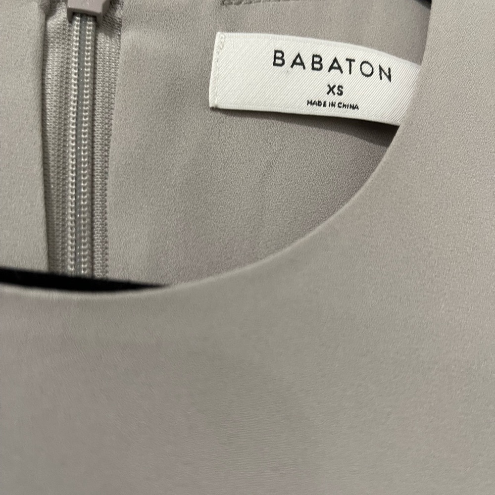 Side slit blouse by Babaton